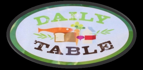 The Daily Table's colorful sign welcomes patrons into the store.